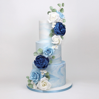 Blue ombre cake with cascading roses