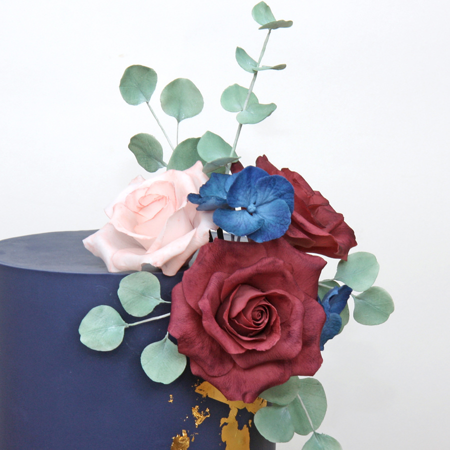 Navy and gold leaf cake